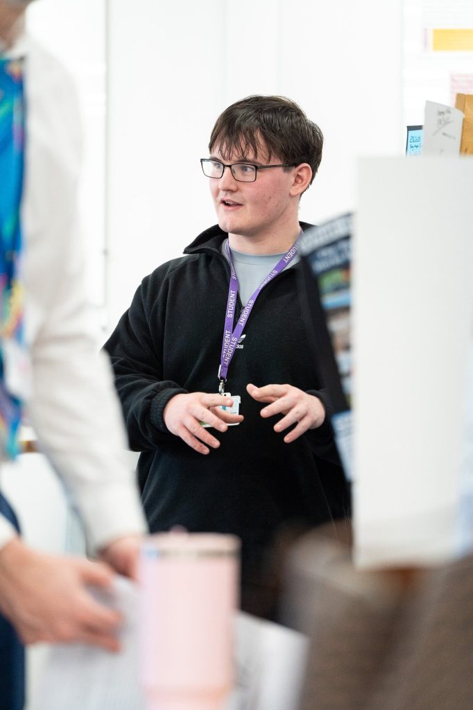 A student presenting to a class