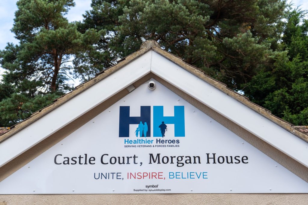 The Castle Court, Morgan House sign with the Healthier Heroes logo and the words unite, inspire, believe